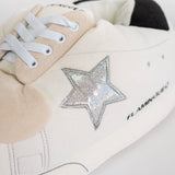Chaussures de maison géantes blanches avec étoile argentée