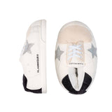 Chaussures de maison géantes blanches avec étoile argentée