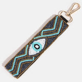 Porte-clés bohème avec perles et œil protecteur: MULTI